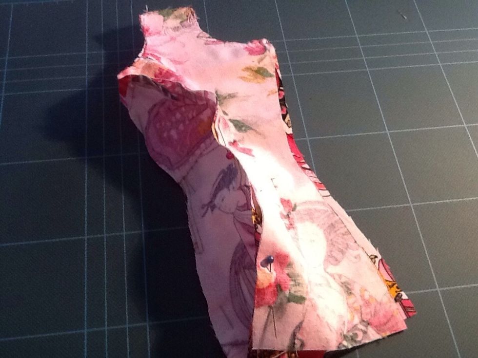 Pin the side pieces to the front and back- like so in the picture. Just align it. This is probably the trickiest part in the whole process. There will be a more detailed pic in the next few steps.