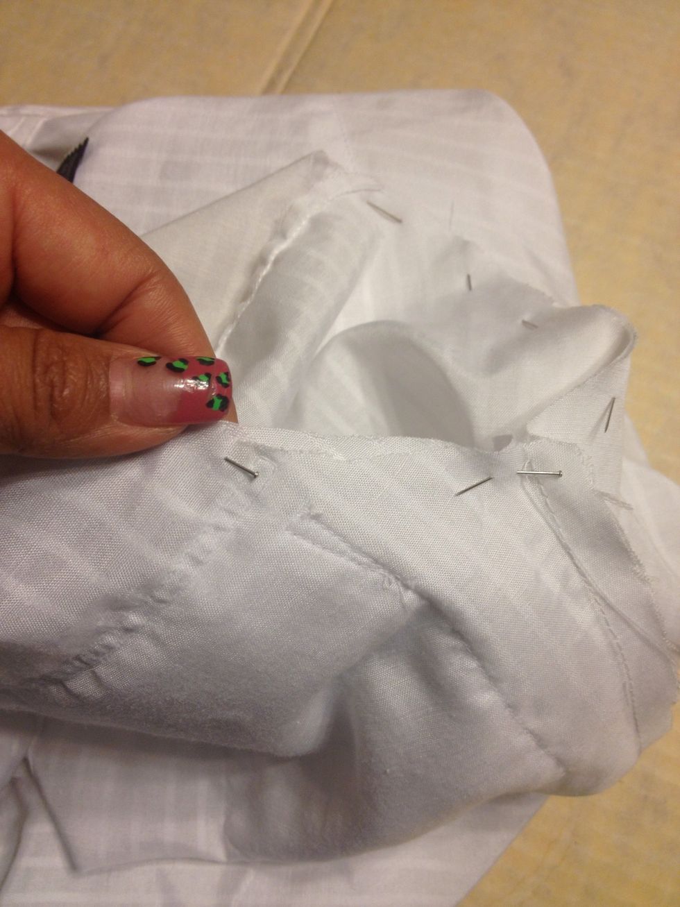 Pin the sleeves to the shirt. Line up the seams. Start pinning around. Then sew the sleeves on!