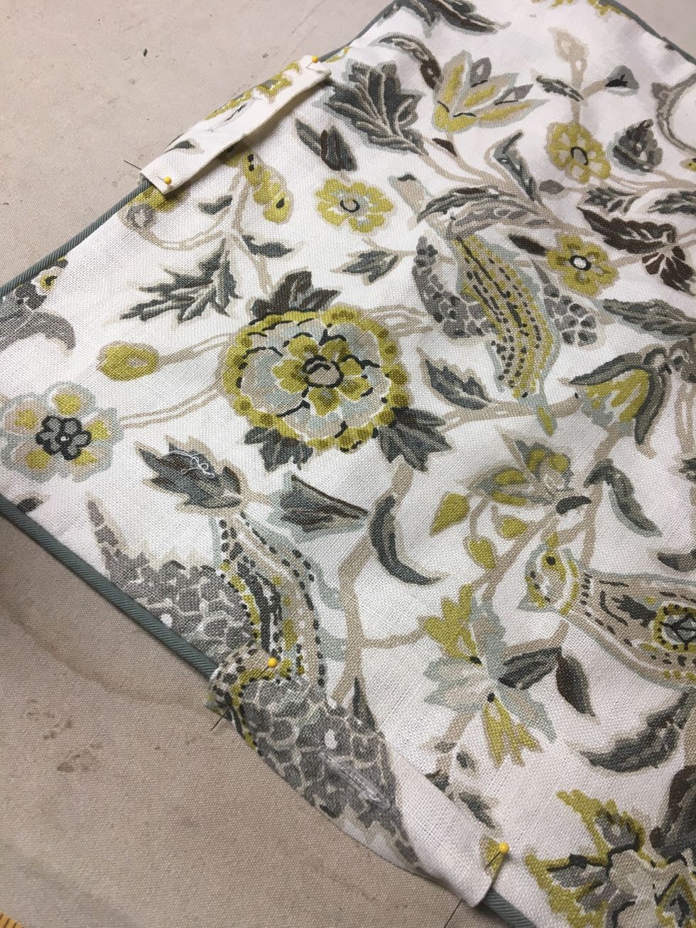 Pin the tabs to each side of the pillow.