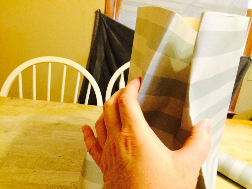Pinch in on creases and fold down.