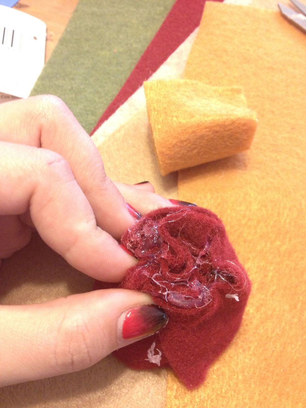 Pinch pinch pinch! *BE CAREFUL* the glue gun is very hot! I have burned my fingertips many a times...