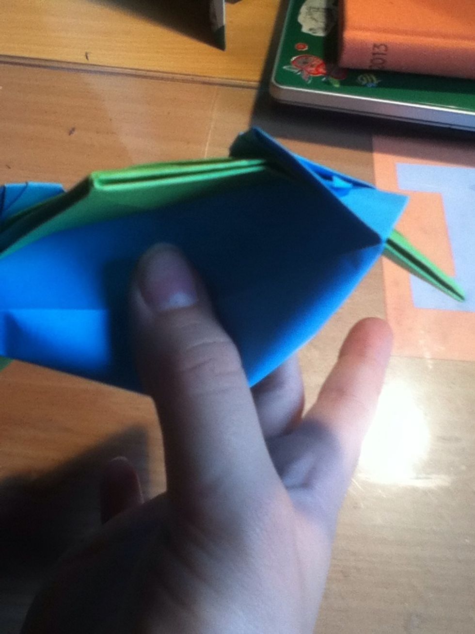 Pinch the bottom box so it pops out, it will take a bit of moulding to get it right