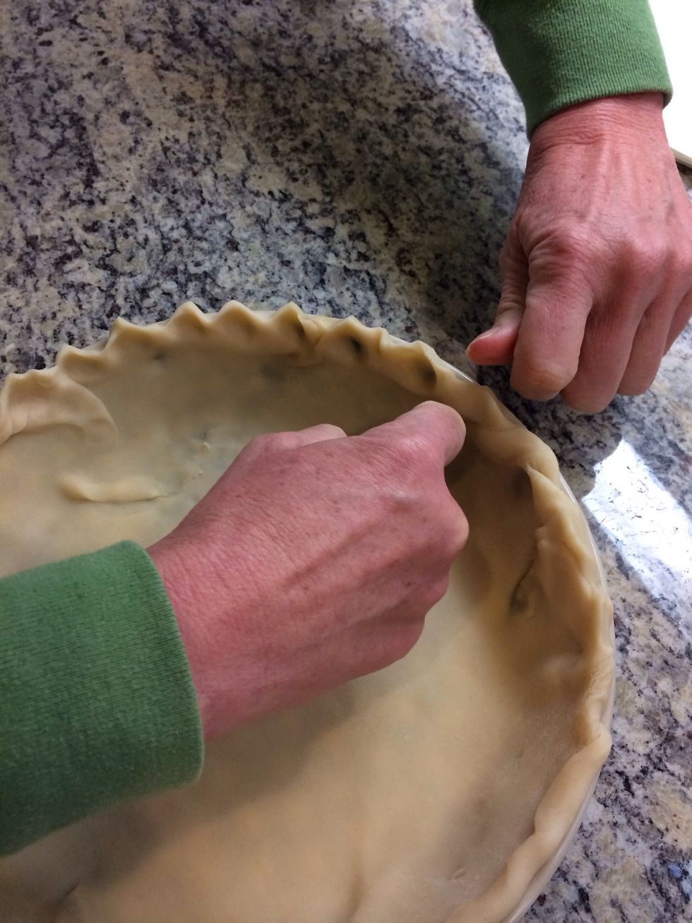 Pinch the edges of the crust together