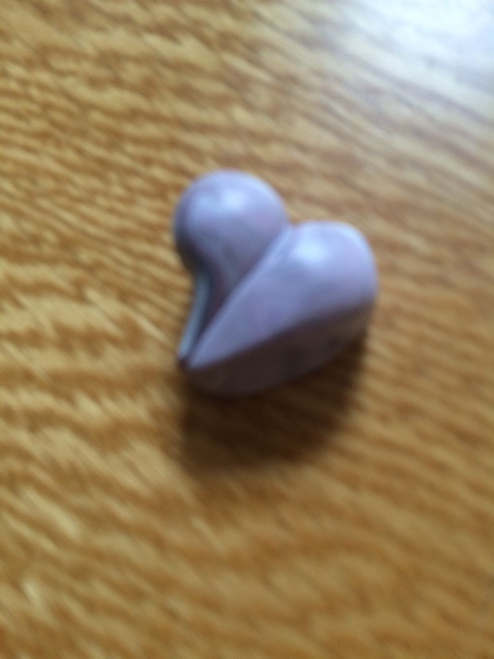 Pinch the ends making a teardrop shape