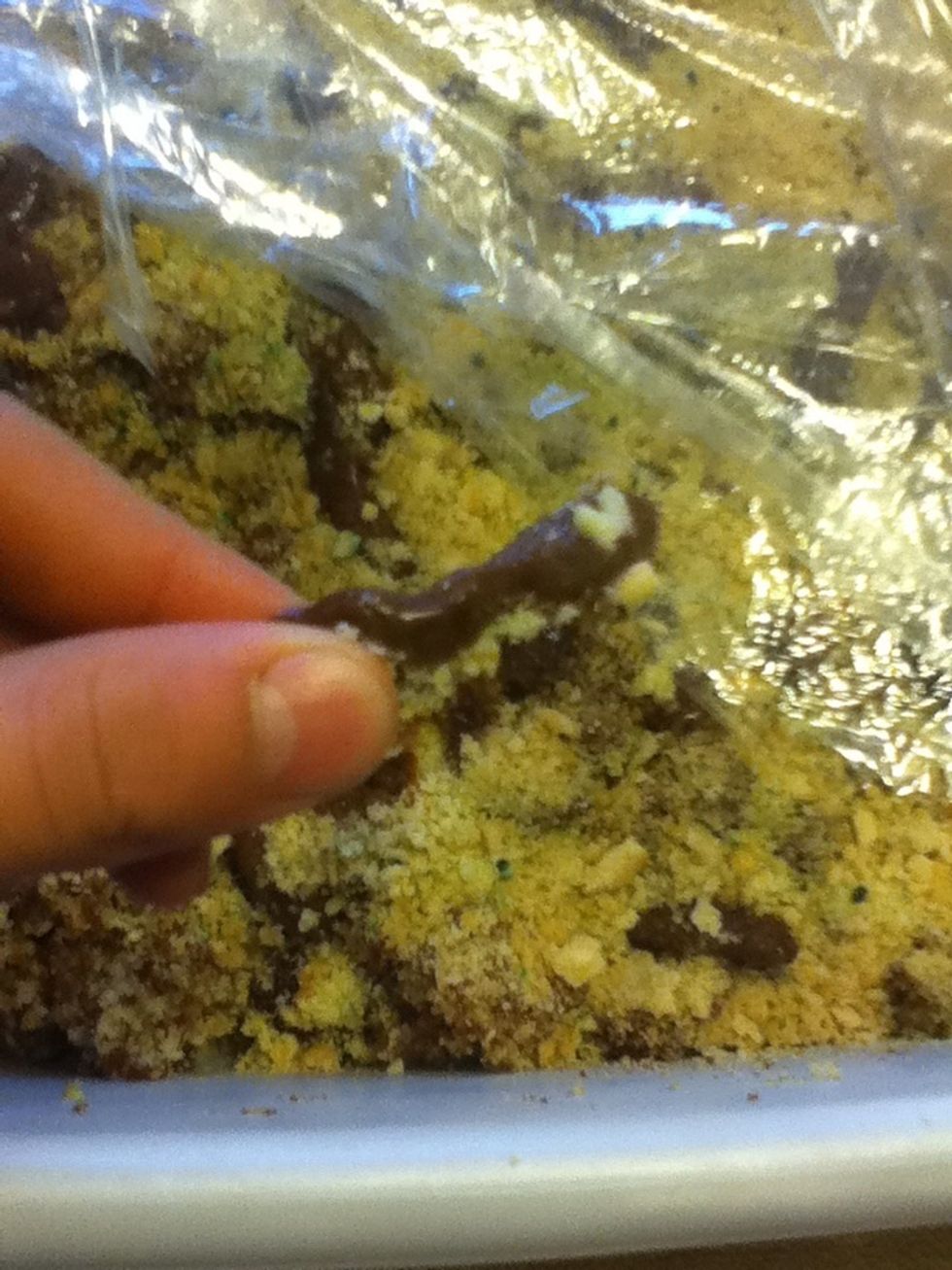 Pinch the ends so they are no longer have a round edge and look convincingly like what cats put in the litter box. Continue this process with as many tootsie rolls as you\u2019d like.