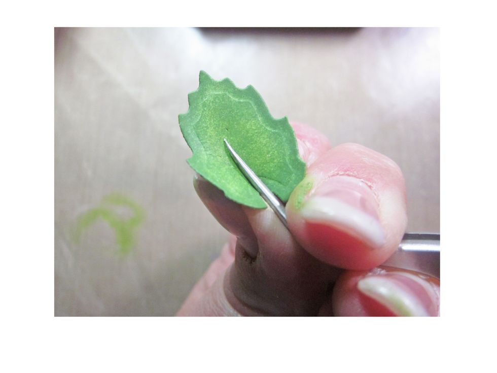 Pinch the leaves upward to finish them off.