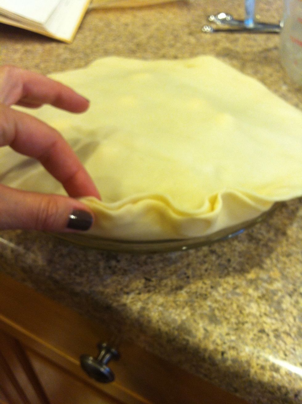 Pinch top & bottom crust together, folding over the edges. Crimp edges closed and cut vent slits in the top (6-8).