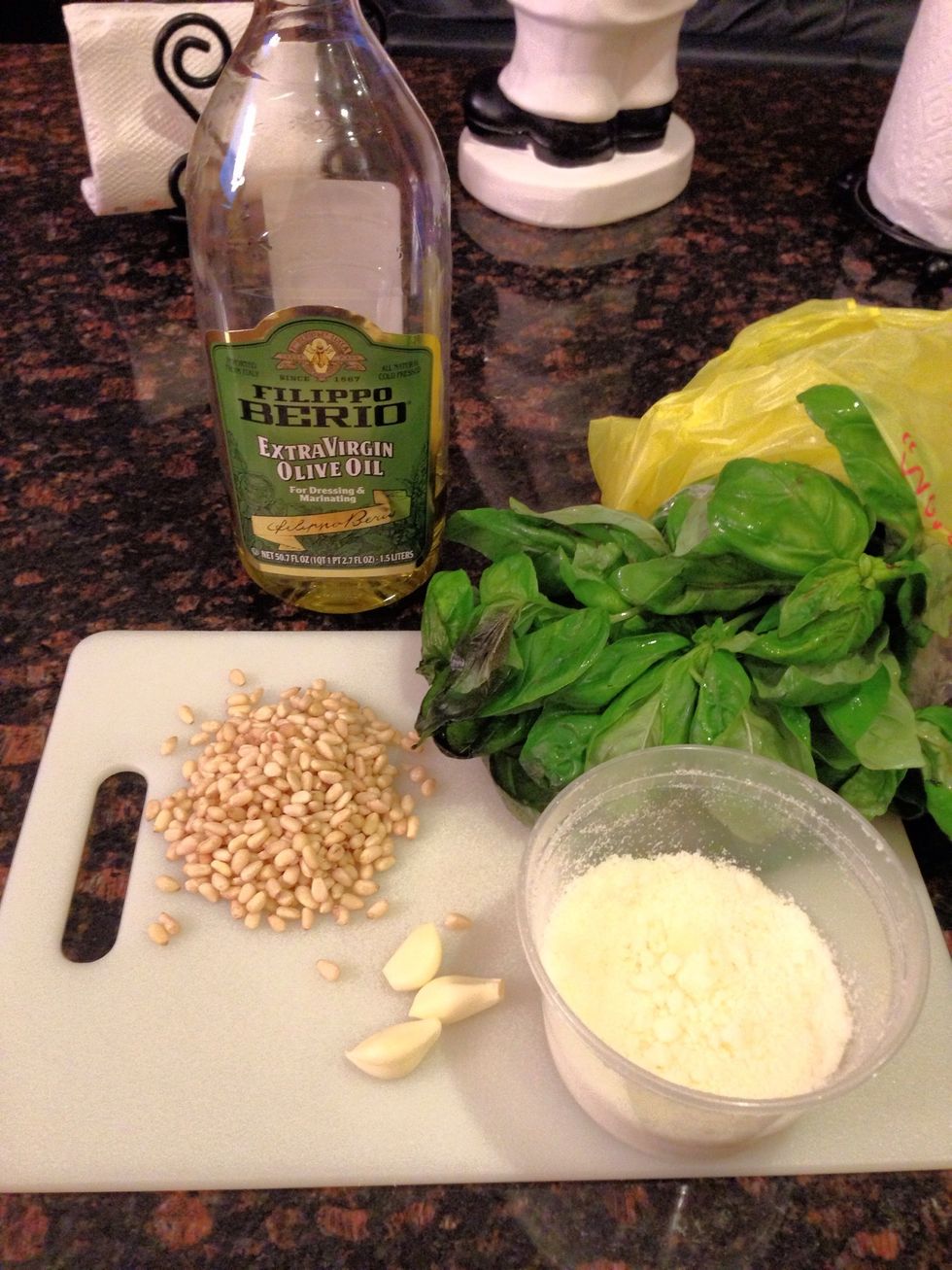 Pine nuts, basil, parmesan cheese, garlic, olive oil and salt are all you need to make a fresh and authentic pesto sauce!