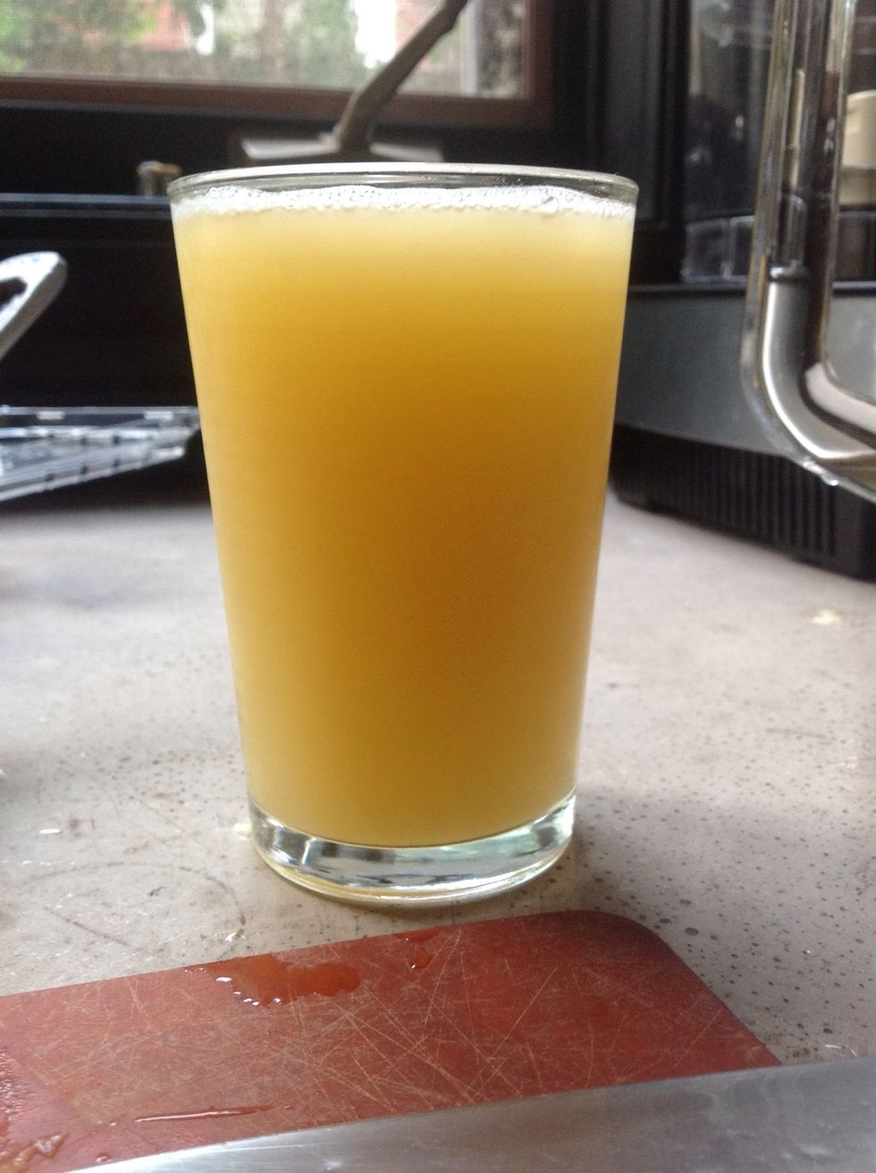 Pineapple juice! Make sure to shake it so there's lots of pulp distributed through the juice, yo.