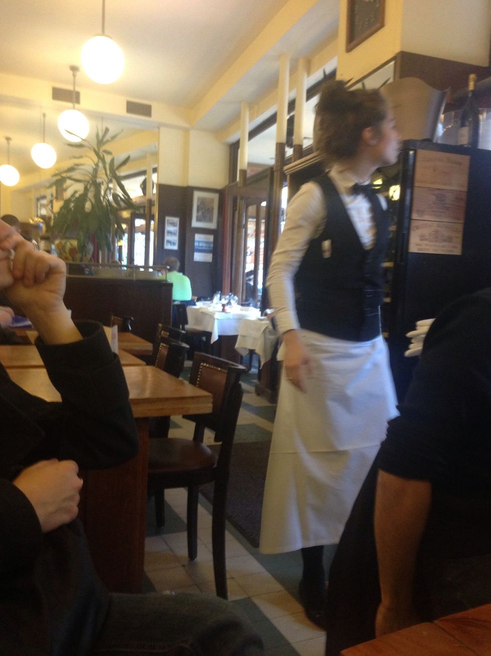 Pinguin dressed waiters are not a sign of a good caf\u00e9 ... It just mean they dress to give you the impression it s good.. So be careful with the price on the menus and the look of the food
