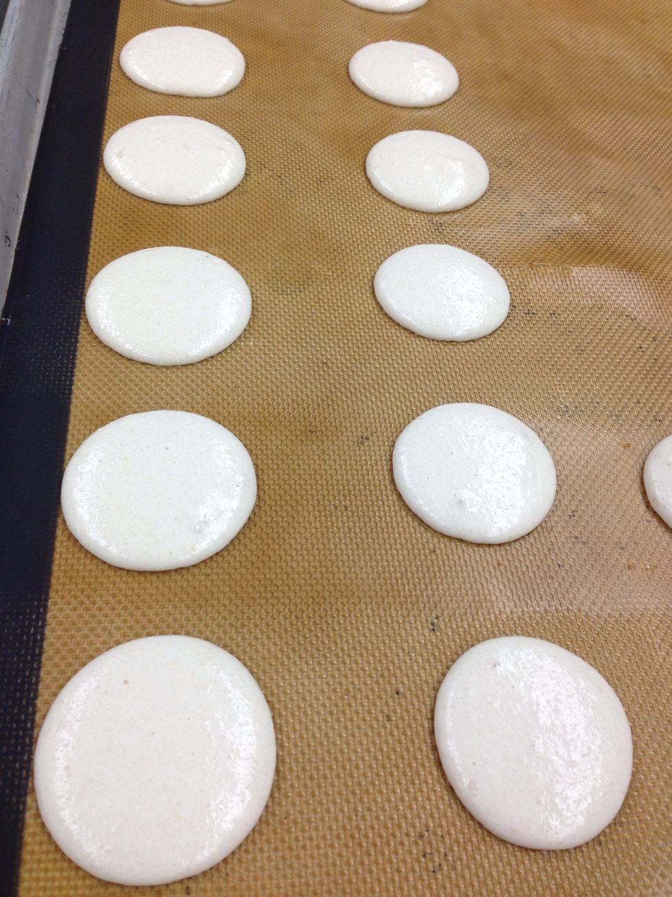 Pipe 1.5-2" discs onto silpat or parchment lined sheet pan.