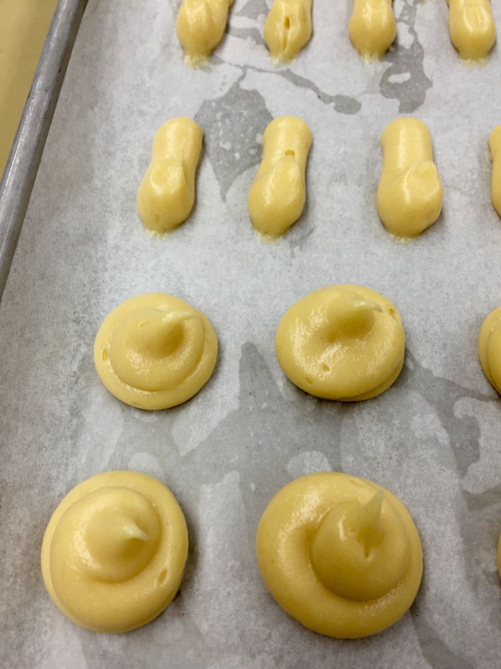 Pipe batter into desired shapes.
