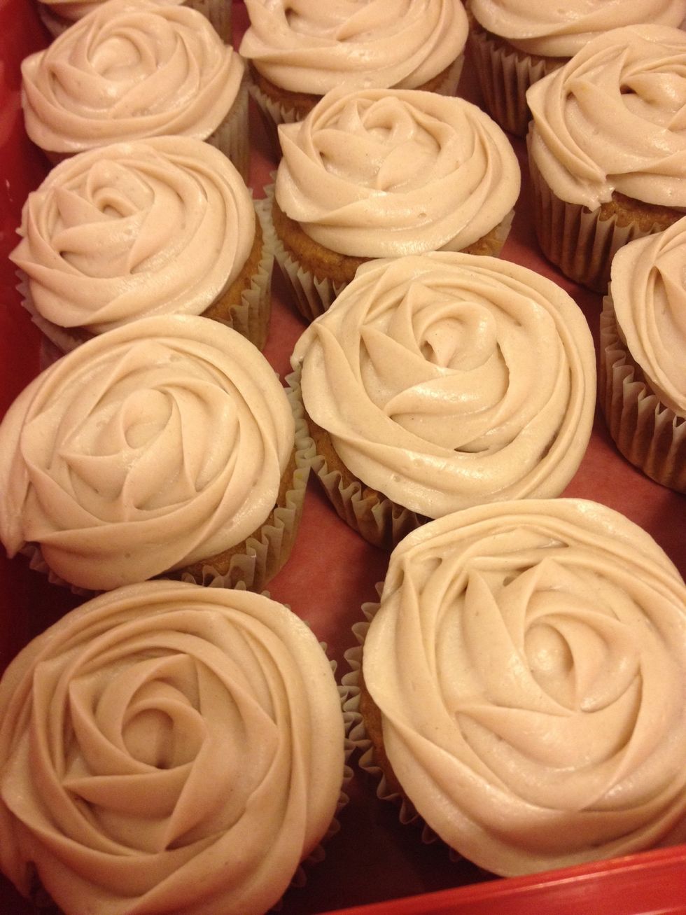 Pipe cupcakes using your favourite piping tool. I like to use a star shaped tip and begin piping in the centre of the cupcake outwards in a clockwise motion to get this rose effect!