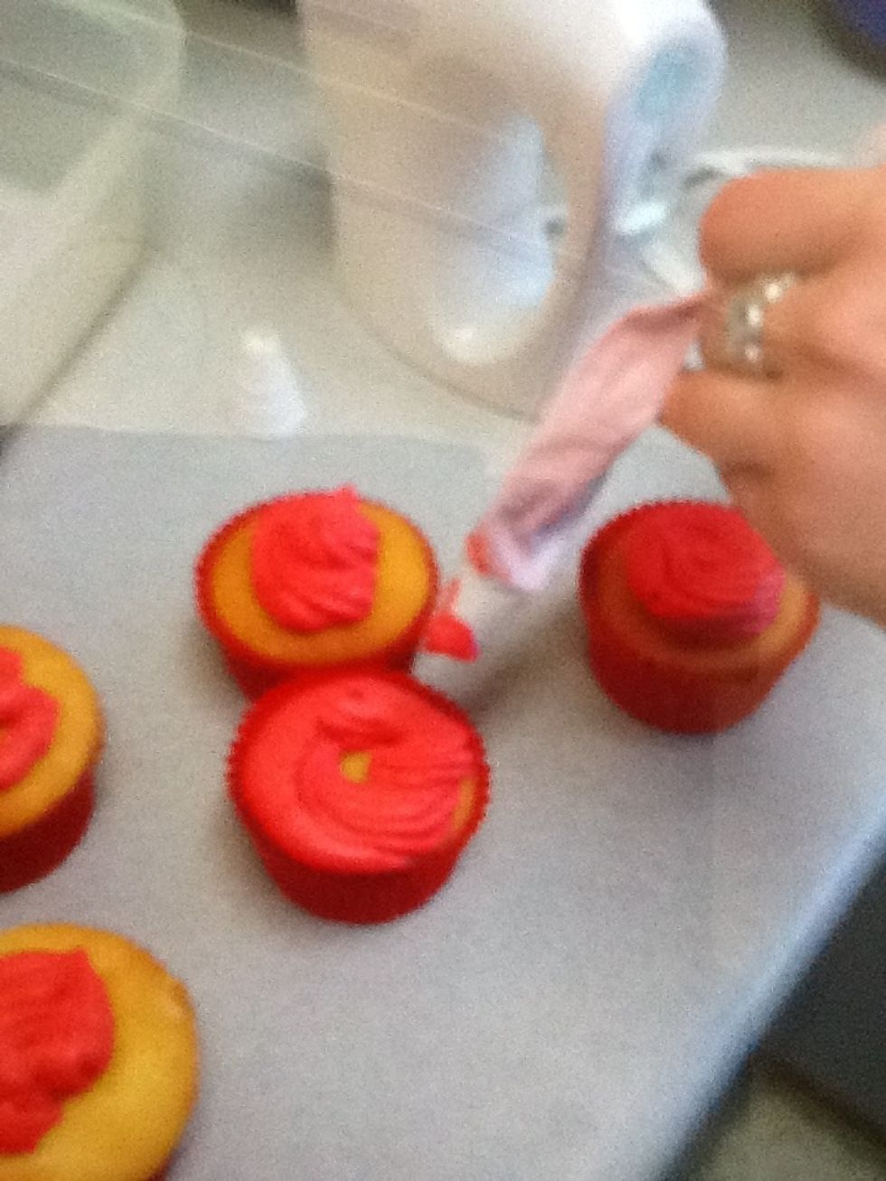 Pipe icing onto pre made and cooled cupcakes