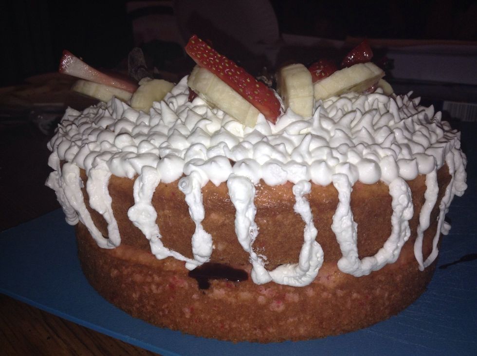 Pipe "streamers" on the side of the cake.