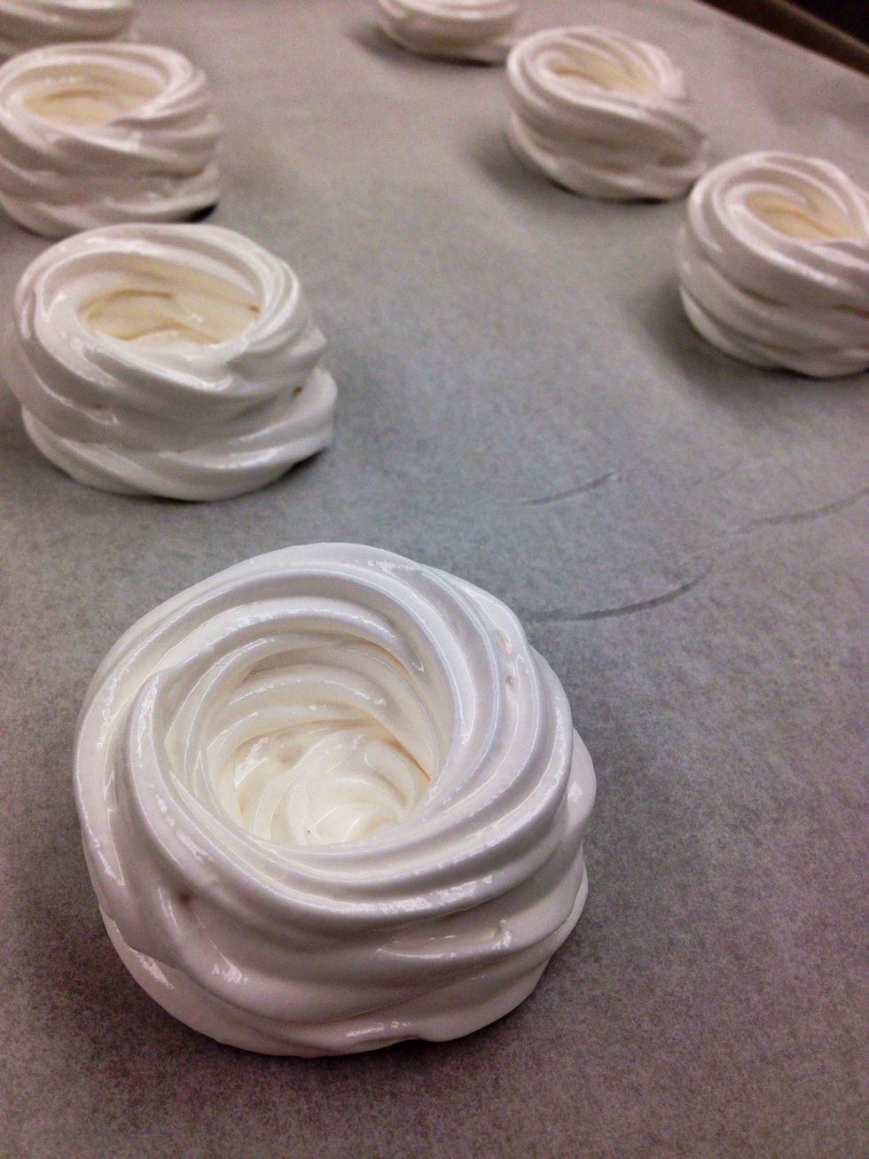 Pipe two circles on top to create a nest