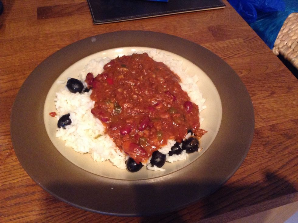 Pit the rice/olive mixture onto a plate then pour on the con carne...your DONE
