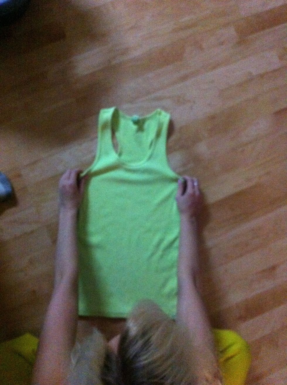 Pitch the arm pit, lol and pick up from there, this will fold the top/straps down