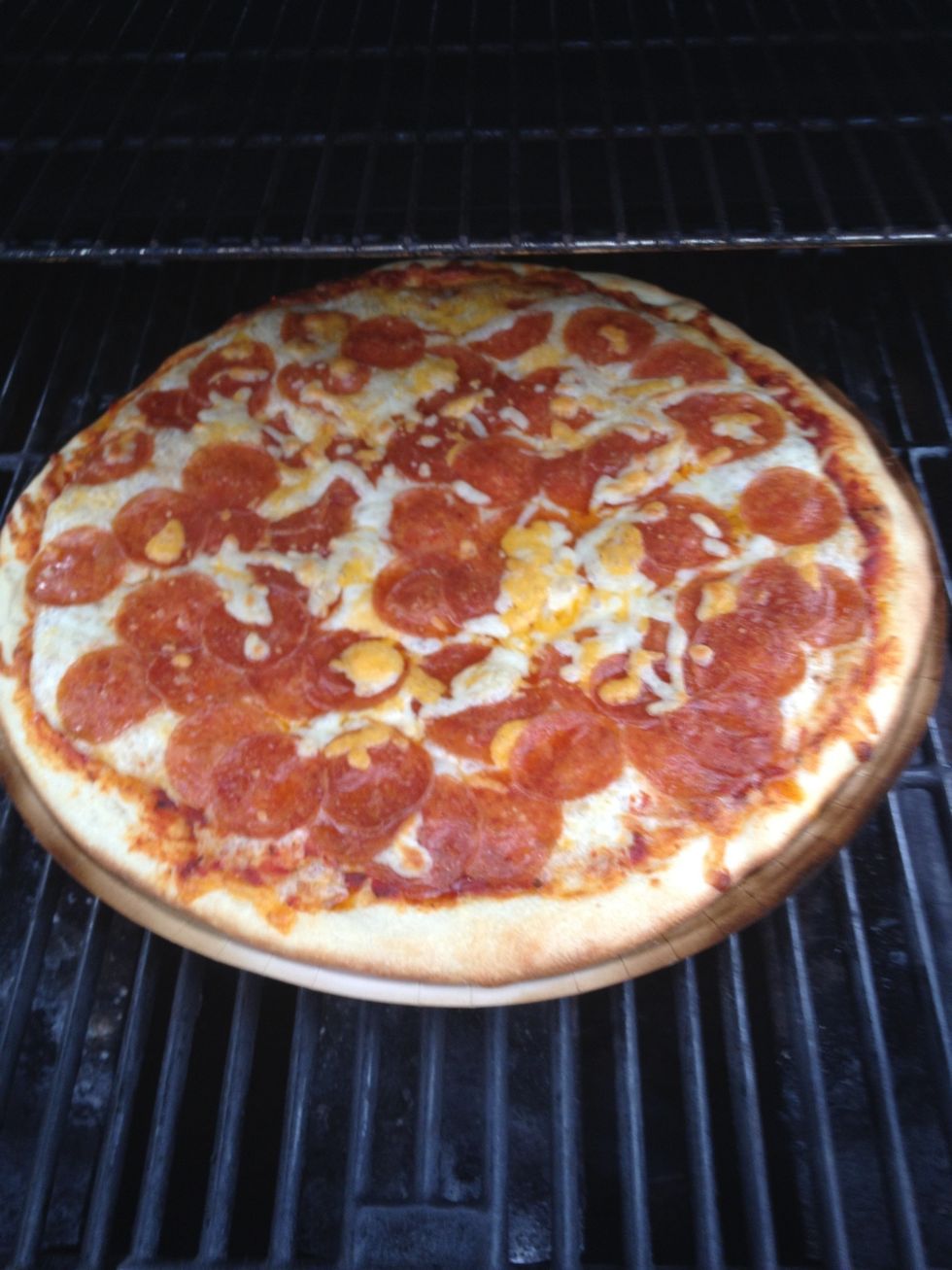 Pizza cooking, looking lovely.