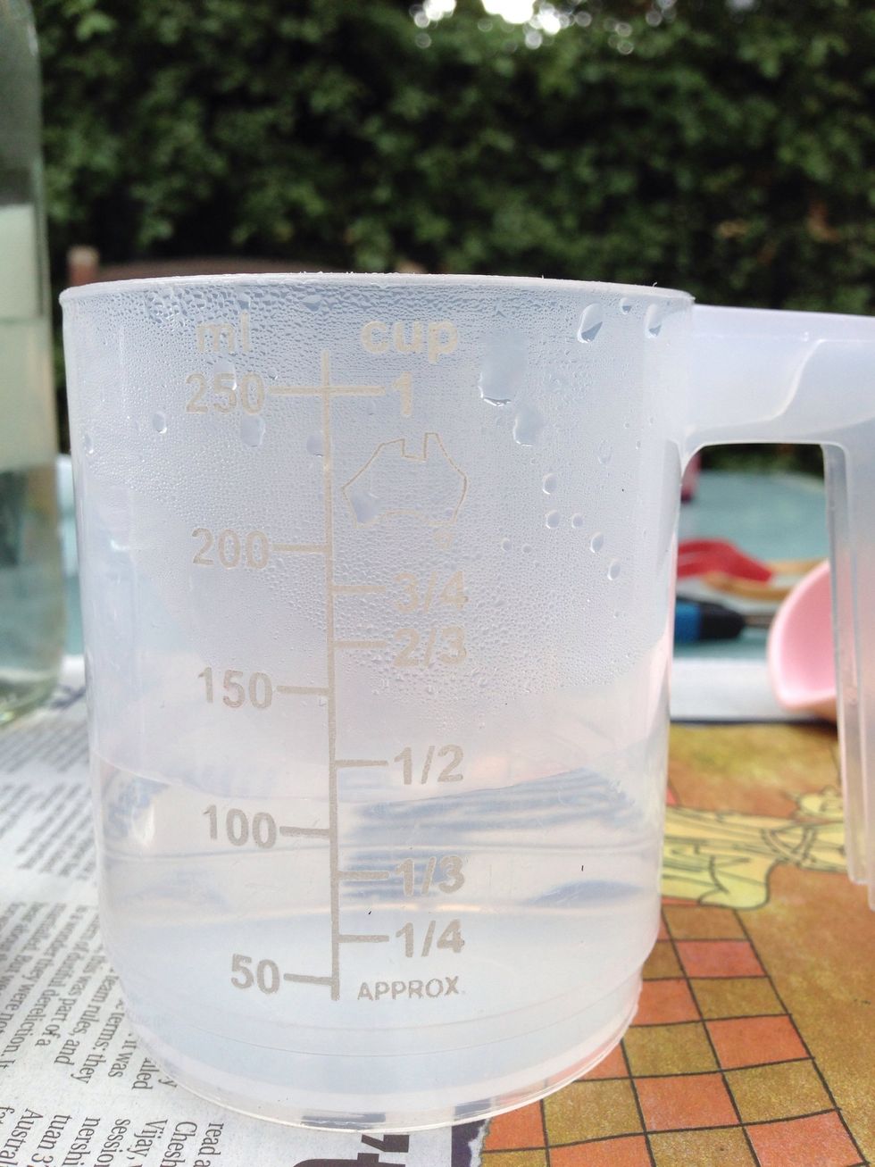 Place 1/2 a cup of boiling water into each jar/cup.