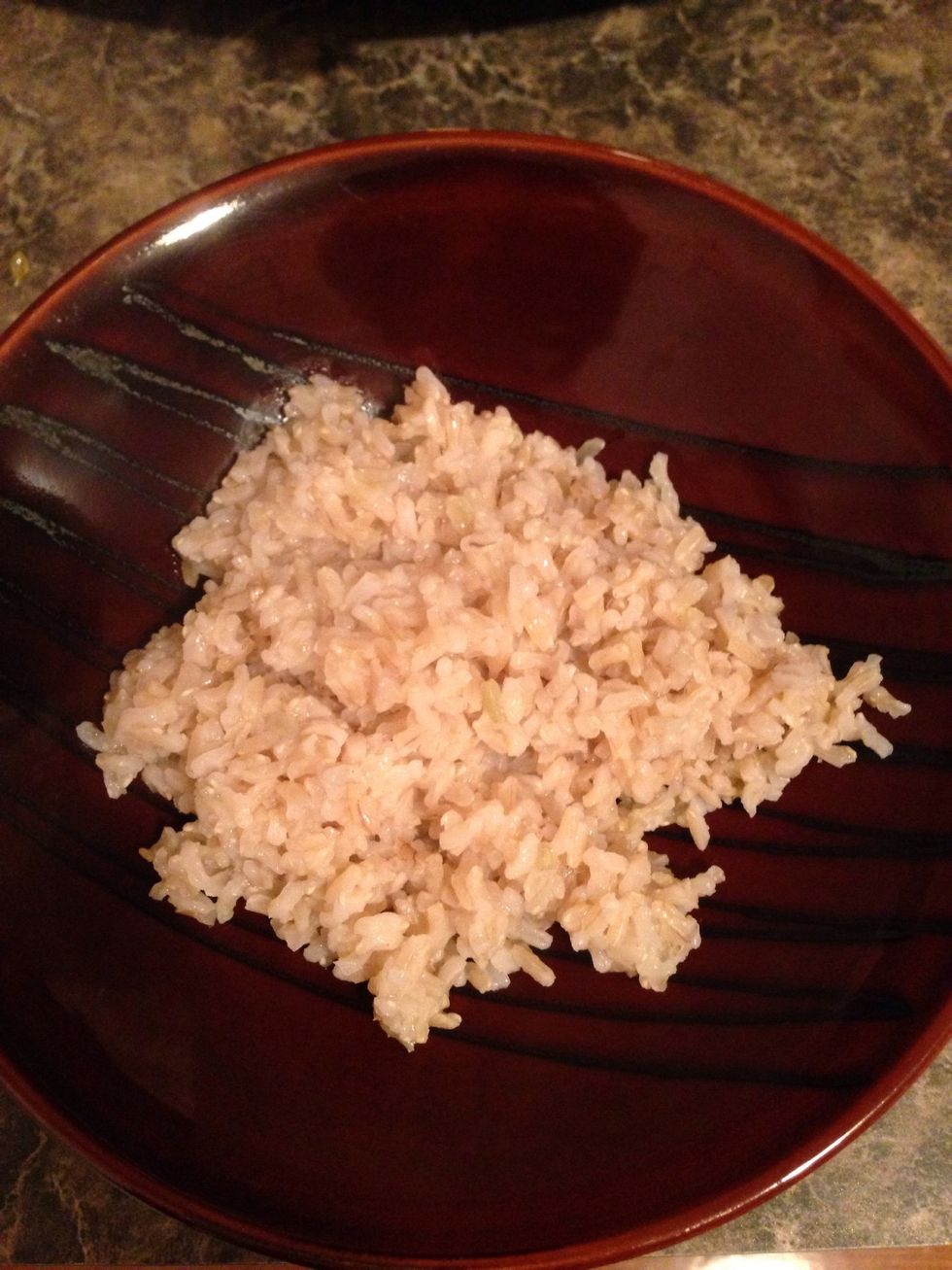 Place 1/2 cup rice into a bowl.