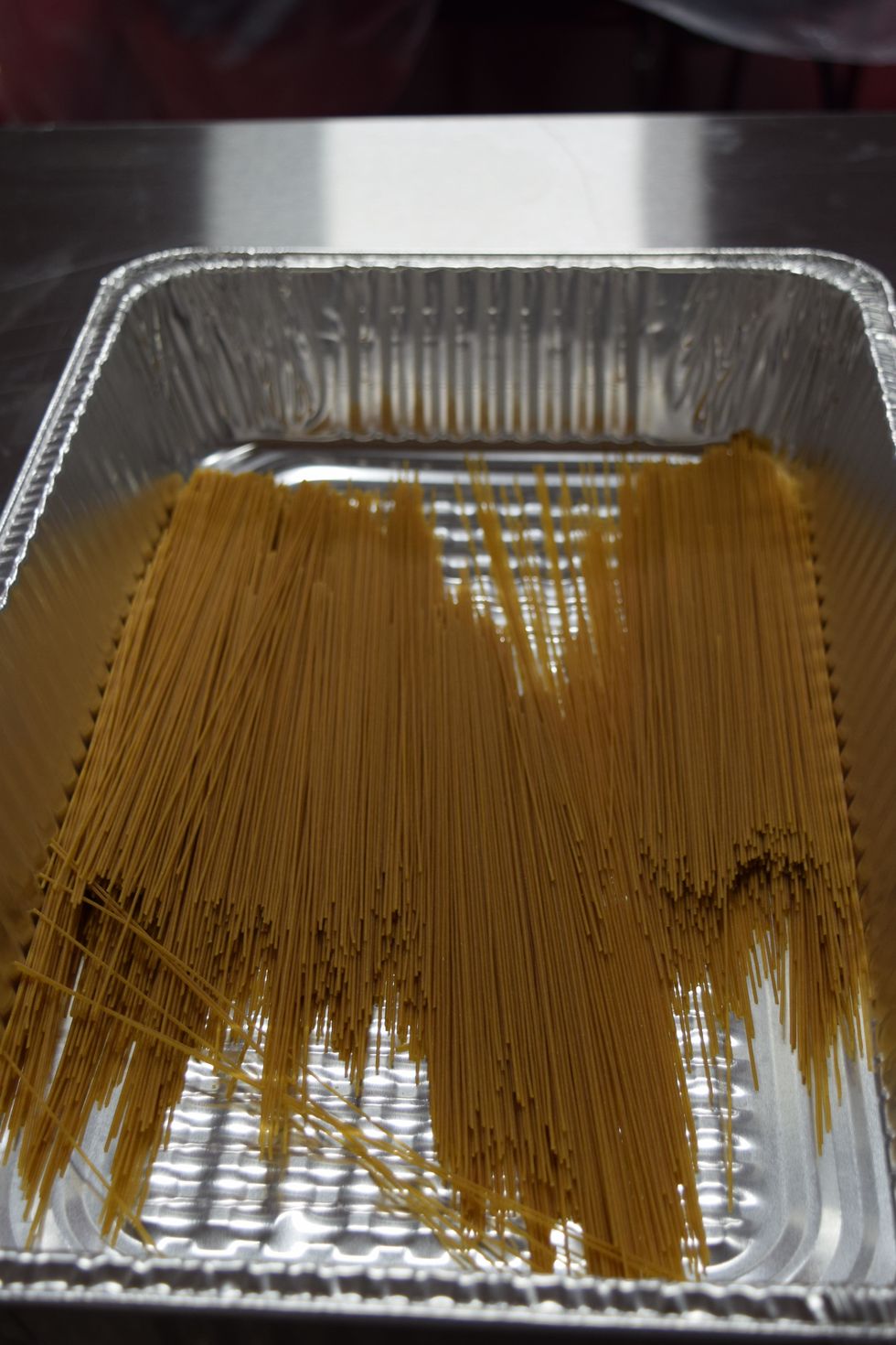 Place 1 pound of pasta into a 4 inch deep pan.