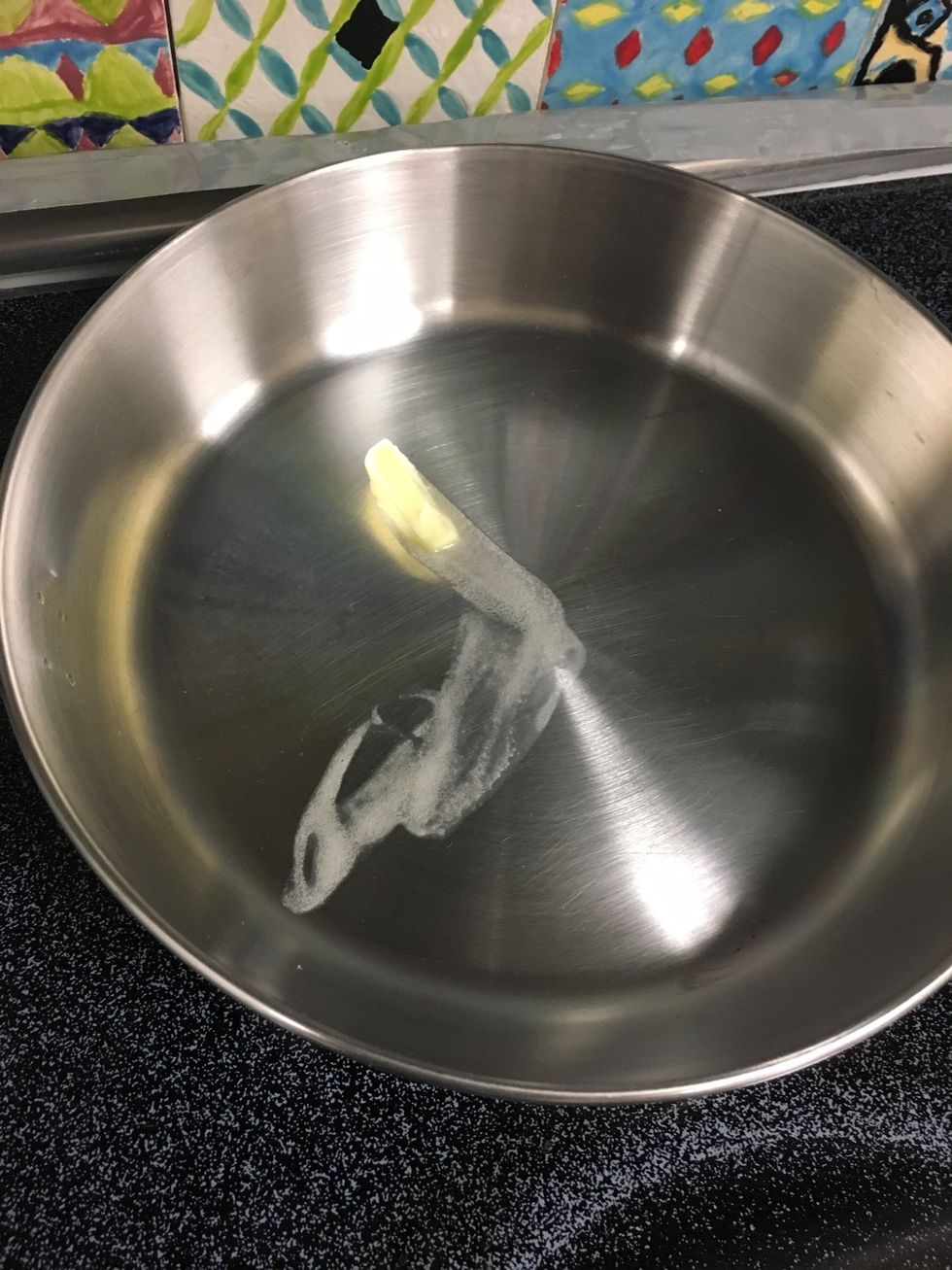 Place 1 teaspoon of butter in the pan