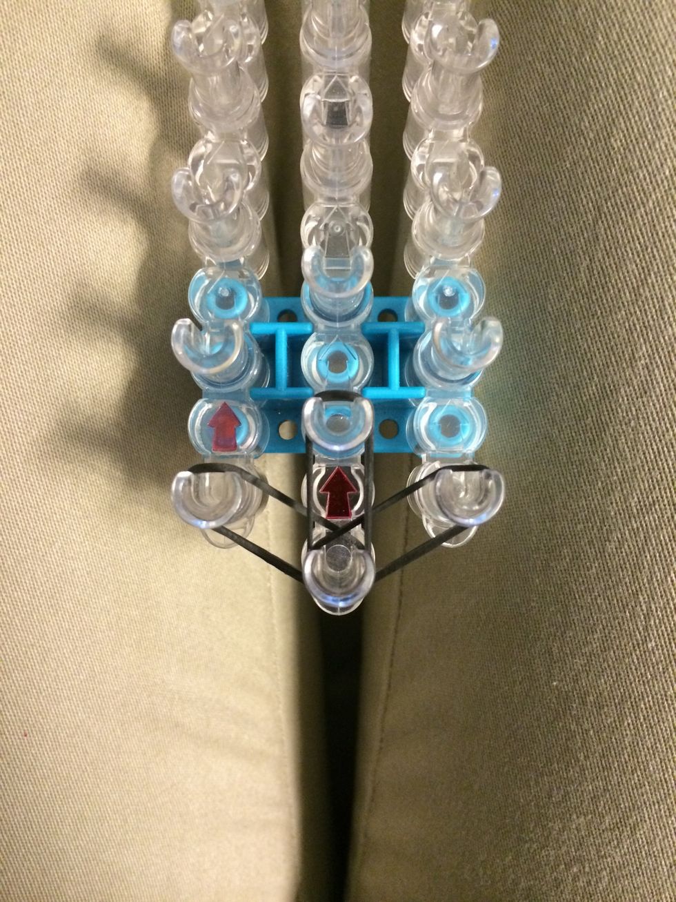 Place 2 black bands up the middle.