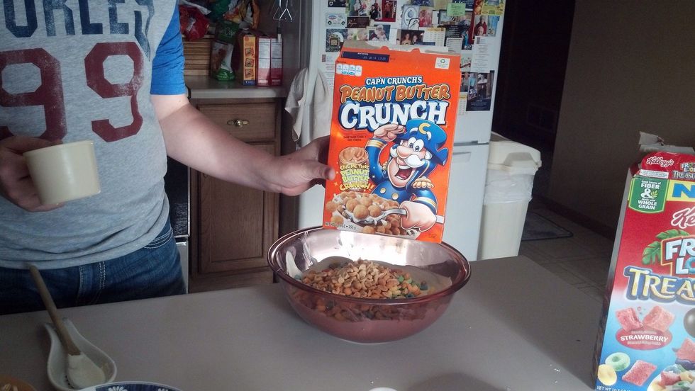 Place 2 cups of penut butter captain crunch.