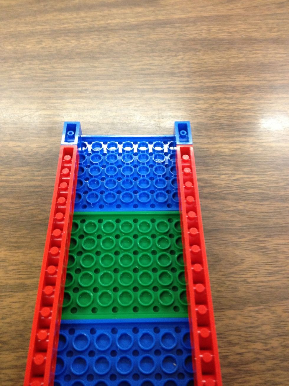 Place 2 one hole beams on front plate.