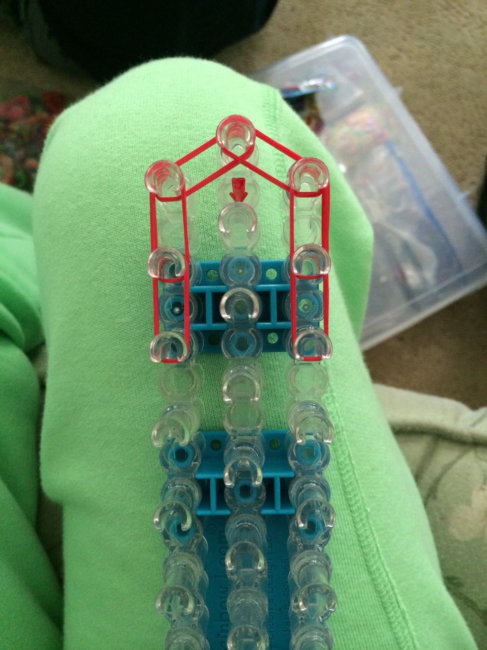 Place 2 sets of red rubber bands on the left side and on the right side