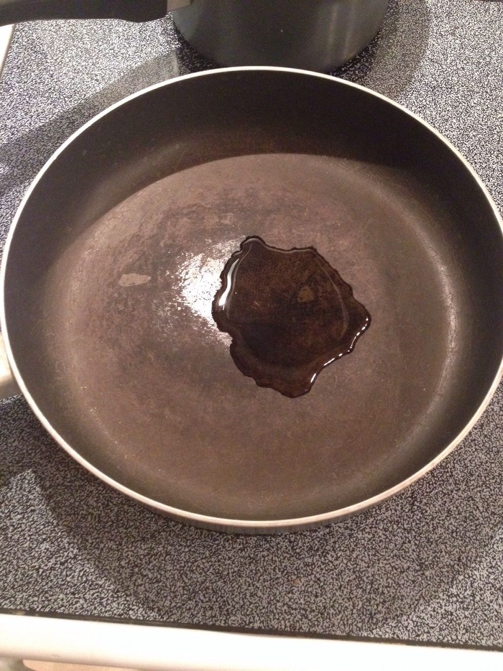 Place 2 Tbsp. olive oil in large pan.