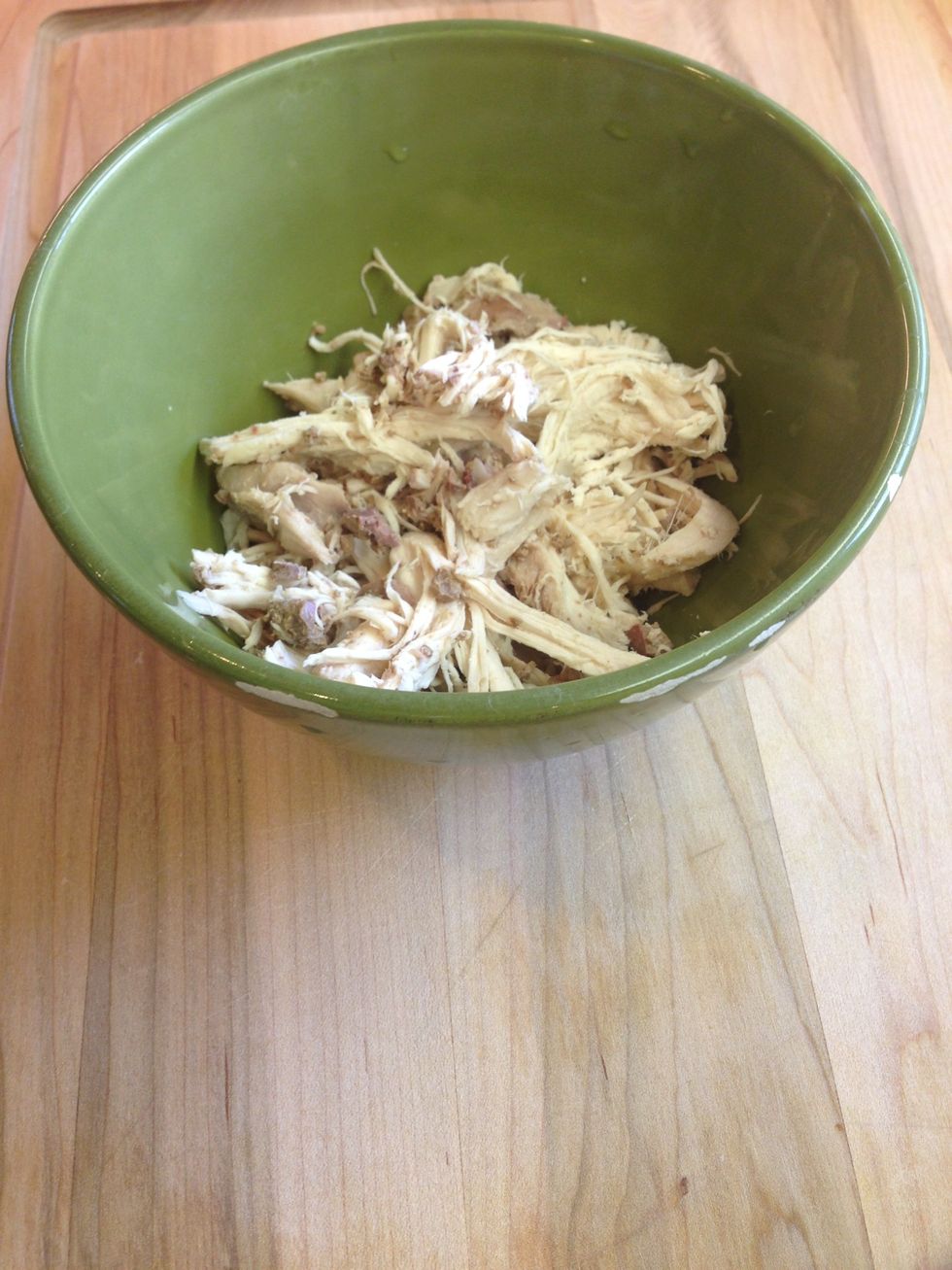 Place 4 to 6 ounces of chicken into a bowl. If your soup is ready, add it on top.