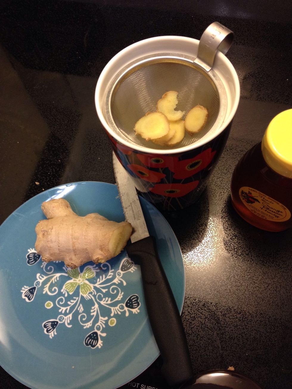 Place 5-6 slices of fresh ginger in your mug or infuser. Add your chamomile (optional but nice for night time). Add hot water. Cover and allow to infuse for 5-10 min for desired strength.