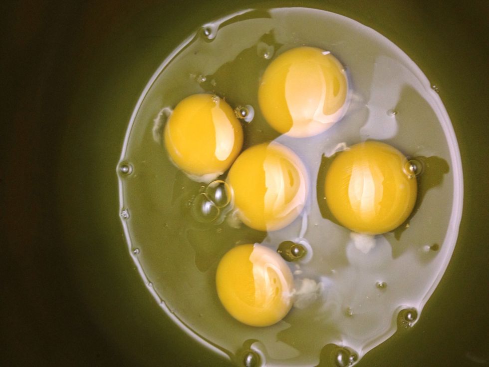 Place 5 eggs in a mixing bowl