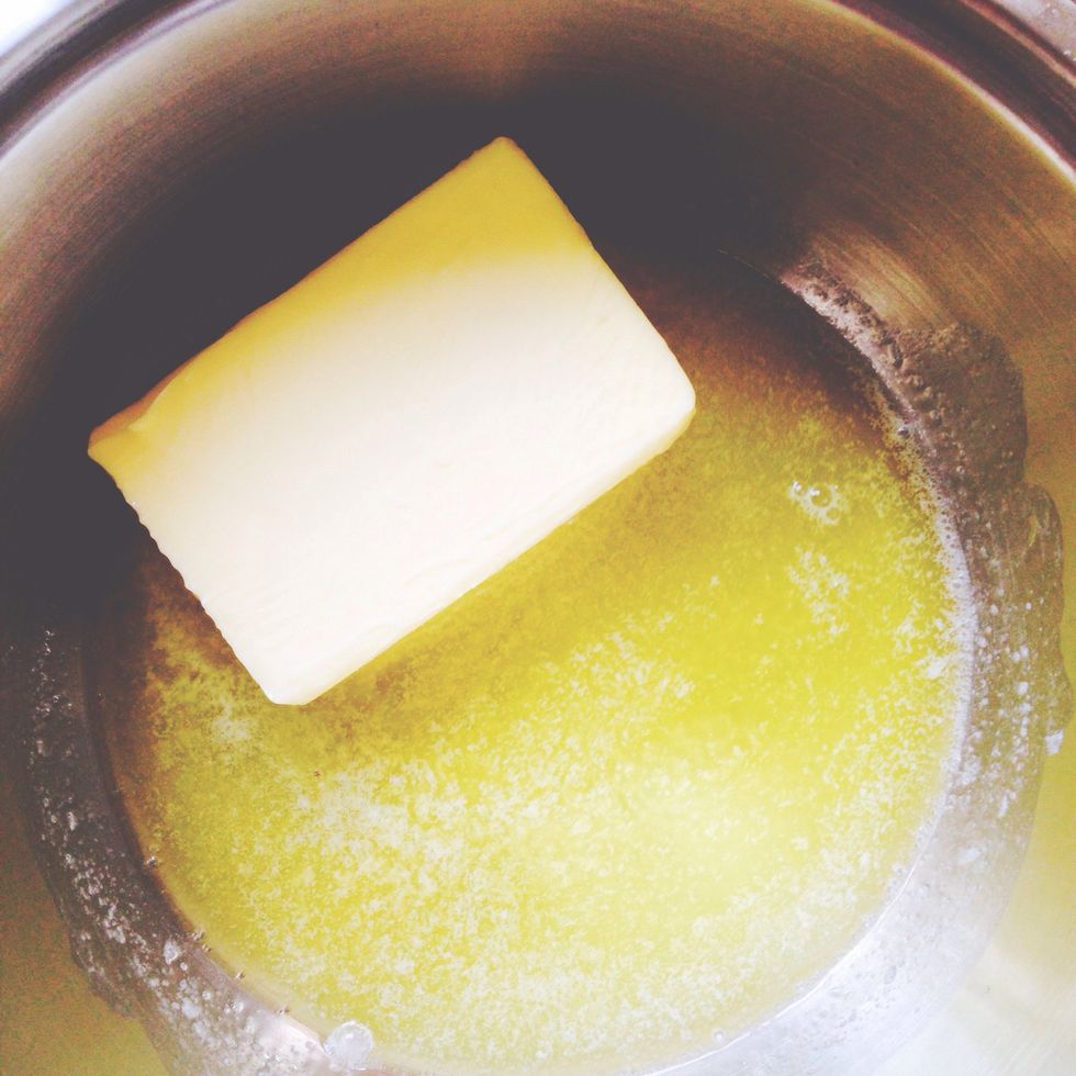 Place 500 grams of butter in a pot and melt over low heat. Once melted, turn your stovetop burner to the lowest possible setting to keep butter melted.