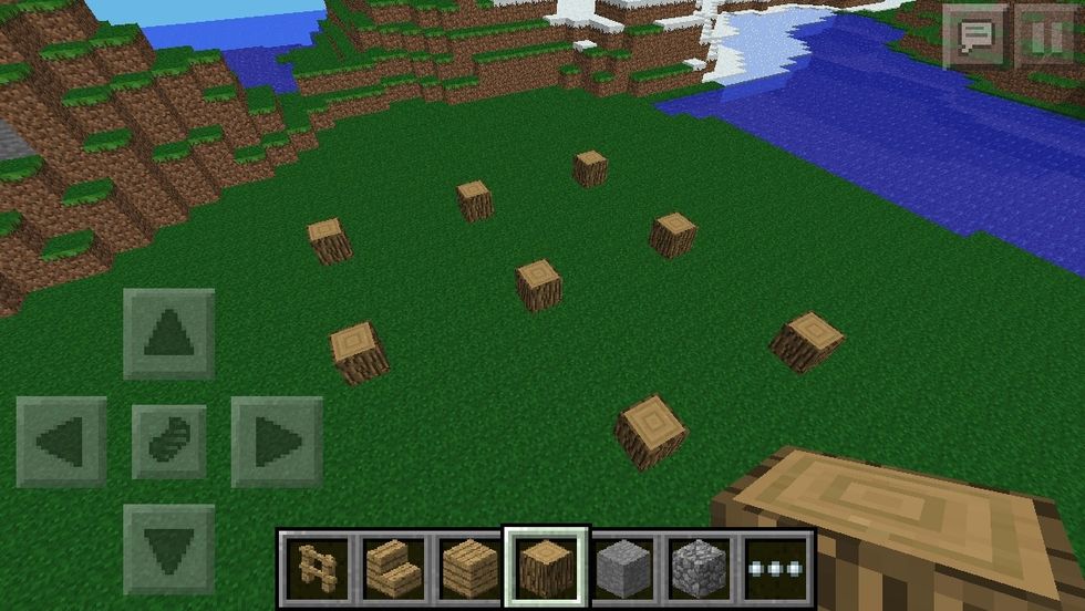 Place 8 Wood blocks, 5 spaces apart, in an "L" shape.