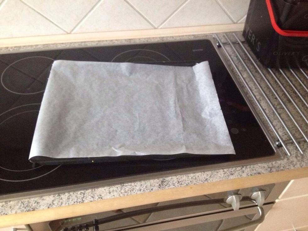 Place a baking sheet on a baking tray