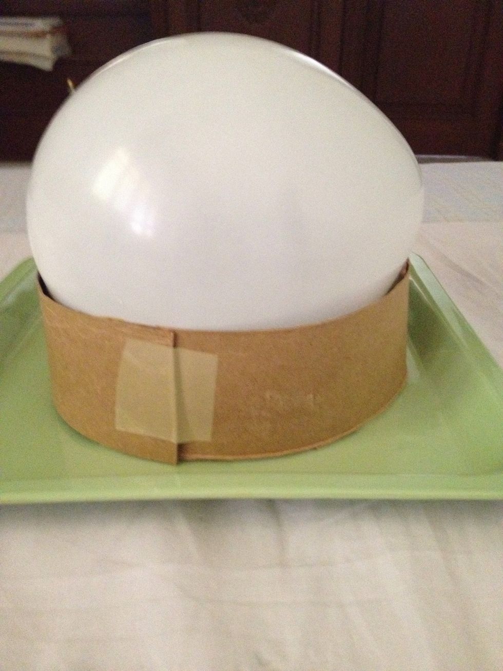 Place a balloon in it