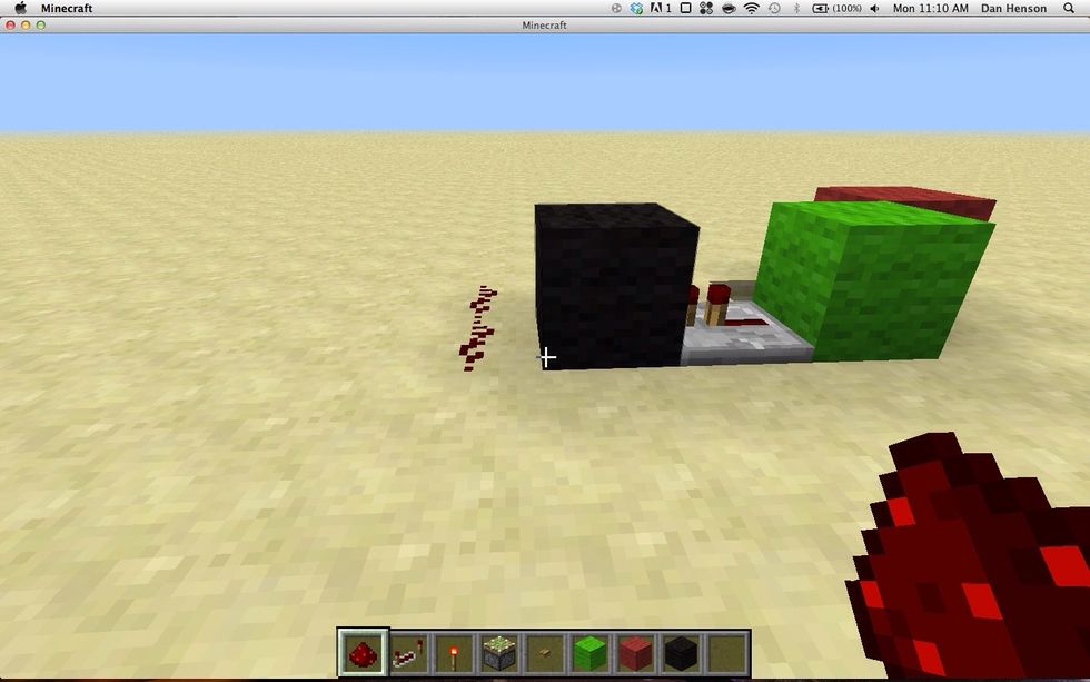 Place a block above the piston, then put 2 redstone down like this.