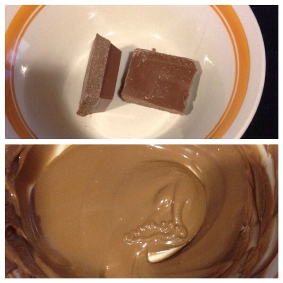 Place a bowl over the pan of water, then place the candy bark into the bowl until it is completely melted. Make sure to bring the heat down to low