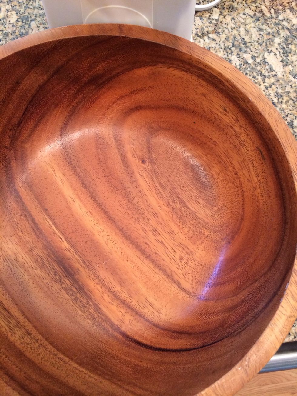 Place a bowl under the funnel to catch the popcorn.