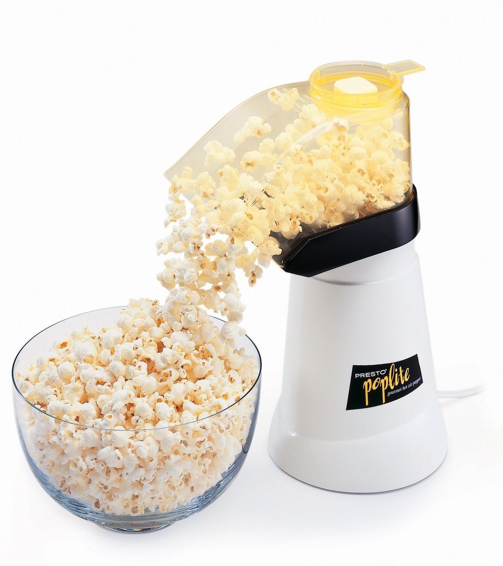 Place a bowl under the spout of the air popper to catch the popcorn as it comes out.