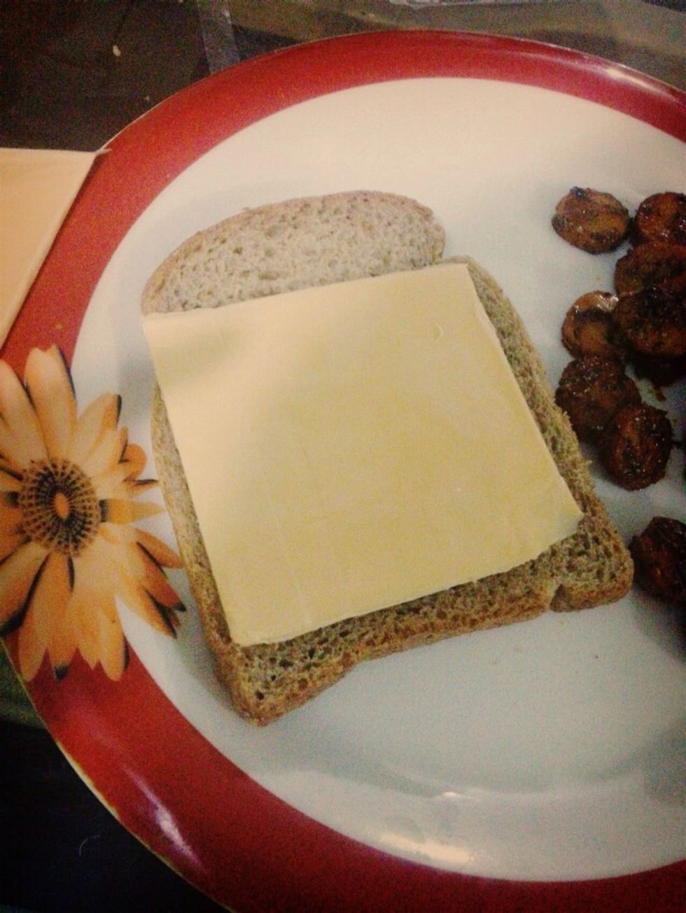 Place a cheese slice on bread
