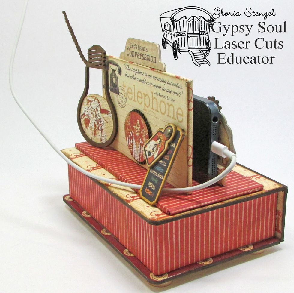 Place a chipboard element at an angle to act as a charging cord holder, as shown.