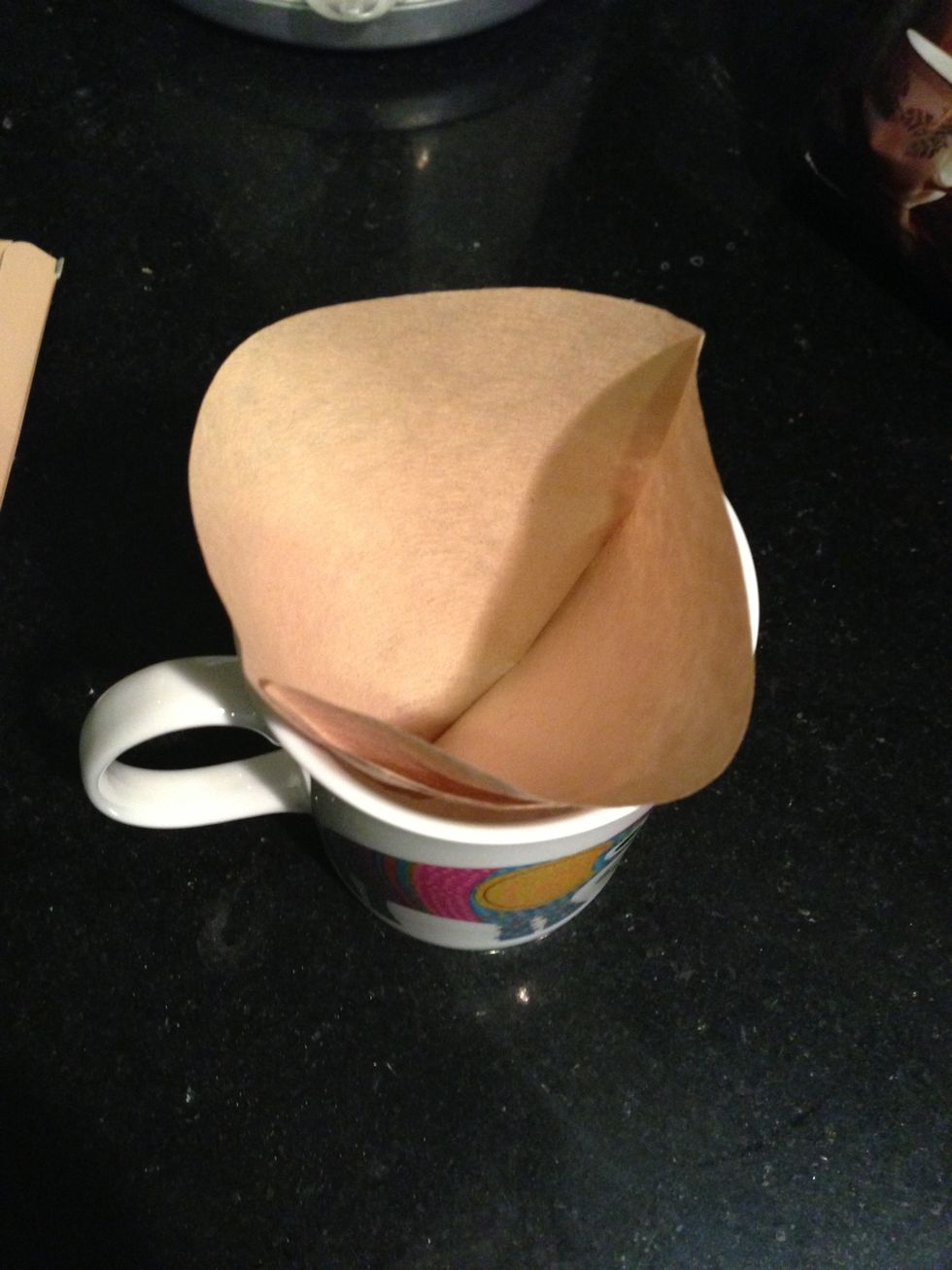 Place a coffee filter in the mug