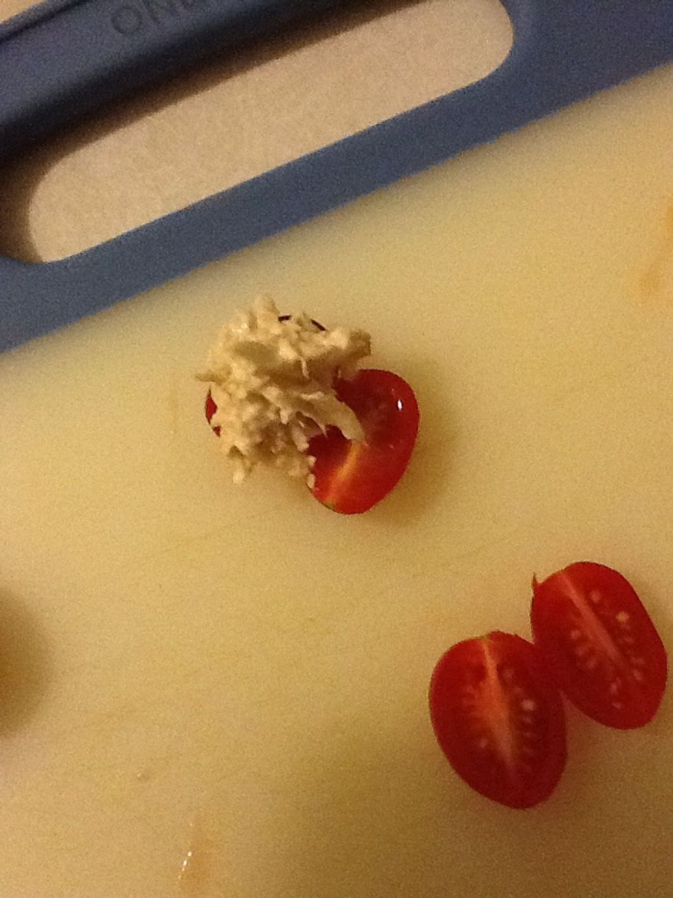 Place a dollop of tuna on one half.