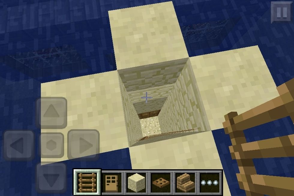 Place a door at the bottom and ladders in the middle