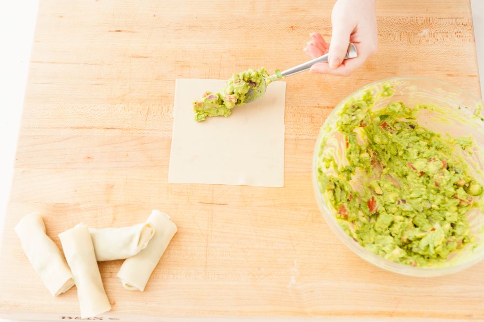 Place a few tablespoons of the avocado mixture in the center of each wrapper.