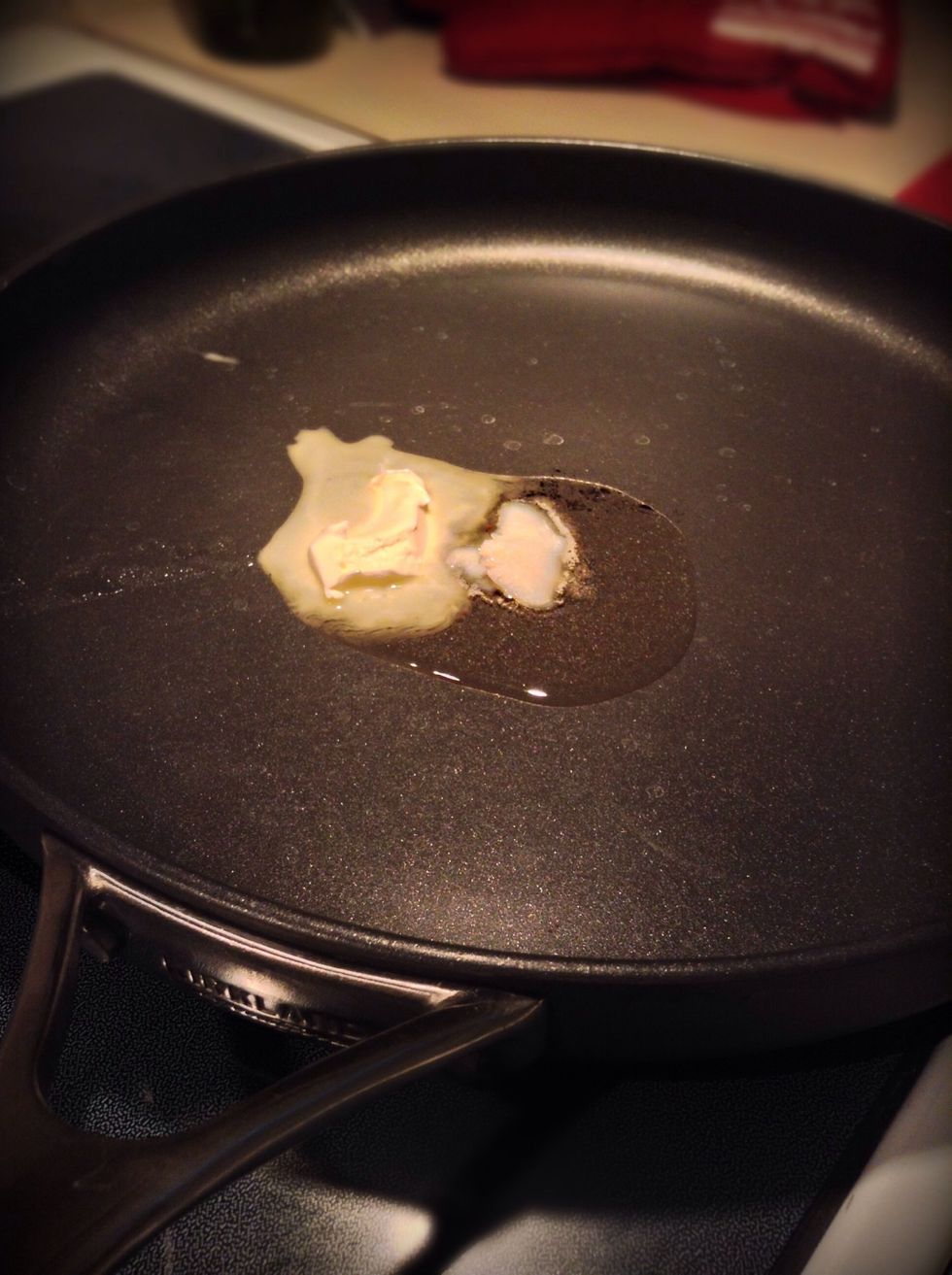 Place a frying pan on medium heat and toss in your butter. I also use a little bit of bacon grease when making these but that's completely optional. It just gives it a little more flavour.